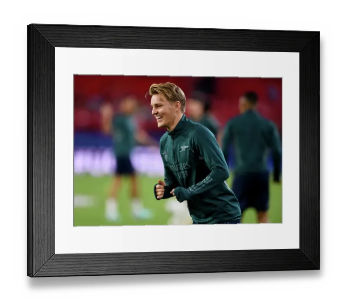 Framed Print : Champions League Showdown: Odegaard's Focus - Sevilla vs. Arsenal: Martin Odegaard's Pre-Game Routine (2023) Framed Print : Champions League Showdown: Odegaard's Focus - Sevilla vs. Arsenal: Martin Odegaard's Pre-Game Routine (2023)