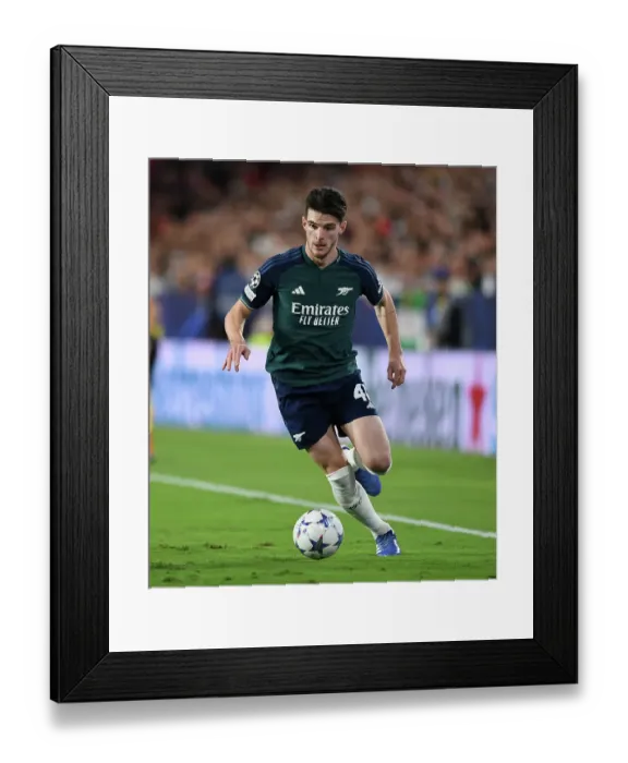 Framed Print : Rice's Shining Performance: Arsenal Tackles Sevilla in Champions League Group B