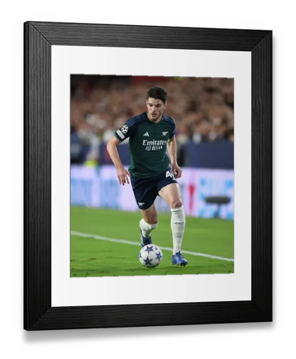 Framed Print : Rice's Shining Performance: Arsenal Tackle Sevilla in Champions League Group B