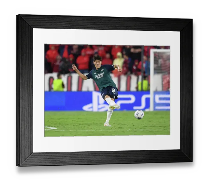 Framed Print : Champions League Group B: Takehiro Tomiyasu in Action - Sevilla vs. Arsenal (2023-24)