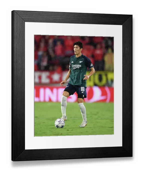 Framed Print : Champions League Showdown: Tomiyasu's Standout Performance - Sevilla vs. Arsenal (2023-24)