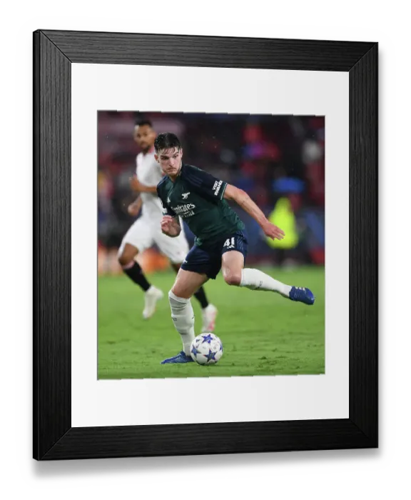 Framed Print : Champions League Showdown: Rice's Standout Performance for Arsenal vs. Sevilla (2023-24)