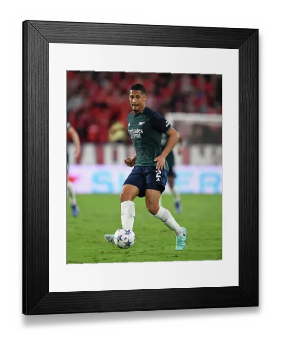 Framed Print : William Saliba's Debut: Arsenal Tackles Sevilla in Champions League (2023-24)