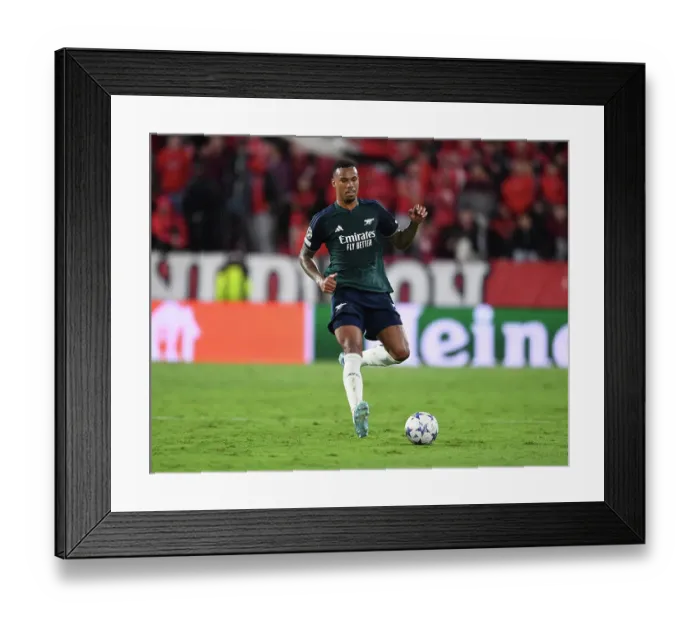 Framed Print : Champions League Group B: Gabriel Magalhaes of Arsenal Faces Off Against Sevilla FC at Estadio Ramon Sanchez Pizjuan, 2023-24
