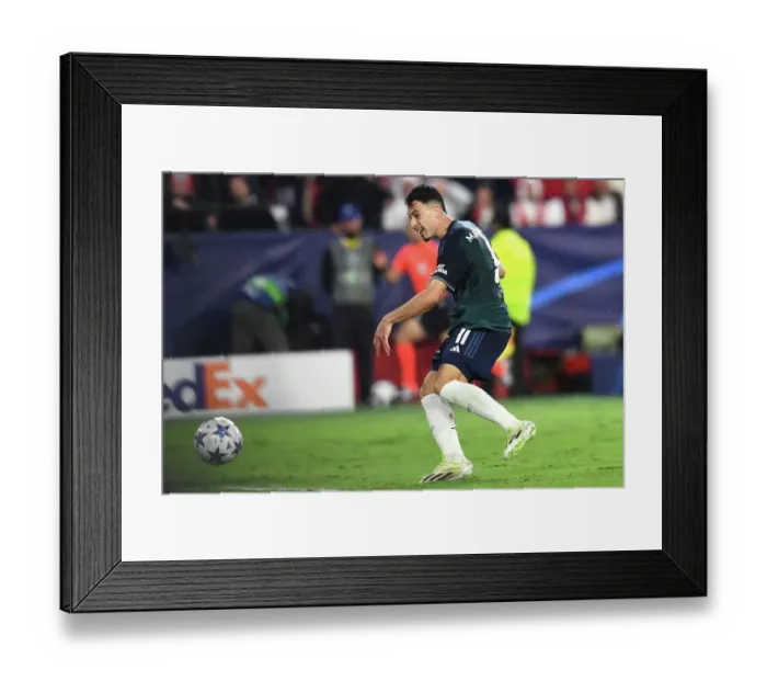 Framed Print : Martinelli Strikes First: Arsenal Tops Sevilla in Champions League Showdown