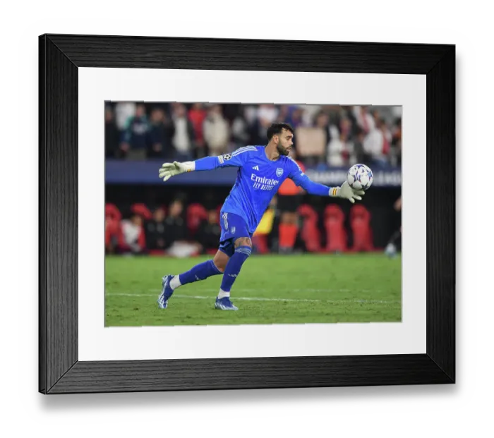 Framed Print : Champions League Showdown: Sevilla vs. Arsenal - David Raya's Pivotal Battle in Seville Framed Print : Champions League Showdown: Sevilla vs. Arsenal - David Raya's Pivotal Battle in Seville