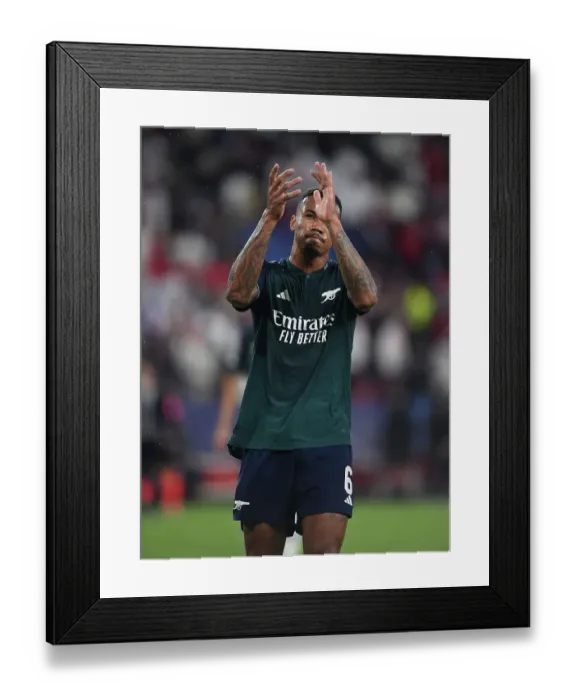 Framed Print : Gabriel Magalhaes Triumphant Salute: Arsenal's Victory Over Sevilla in the 2023-24 UEFA Champions League Framed Print : Gabriel Magalhaes Triumphant Salute: Arsenal's Victory Over Sevilla in the 2023-24 UEFA Champions League