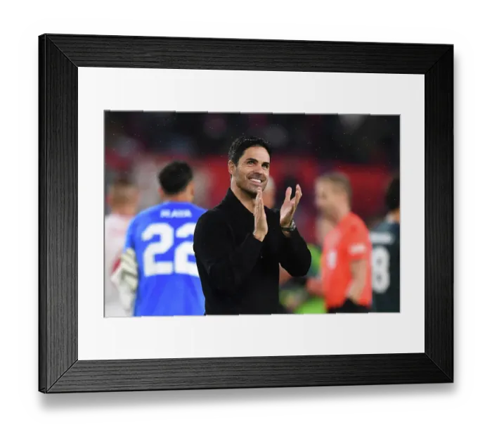 Framed Print : Arsenal's Triumph in Seville: Mikel Arteta's Team Wins in the UEFA Champions League against Sevilla FC