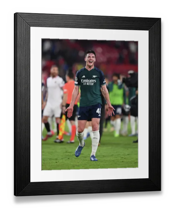 Framed Print : Declan Rice's Emotional Moment: Sevilla vs. Arsenal in the Champions League (2023-24)