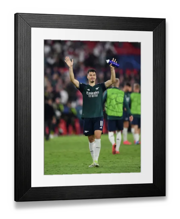 Framed Print : Martinelli's Wave: Arsenal Triumphs Over Sevilla in Champions League Group Stage