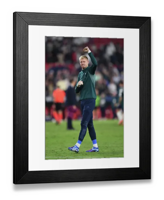 Framed Print : Arsenal's Ramsdale Reacts: Sevilla vs. Arsenal in Champions League Group B (2023-24)