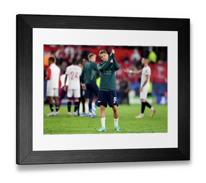 Framed Print : Arsenal's Triumph in Seville: Martin Odegaard Leads Champions League Victory over Sevilla FC (2023-24)