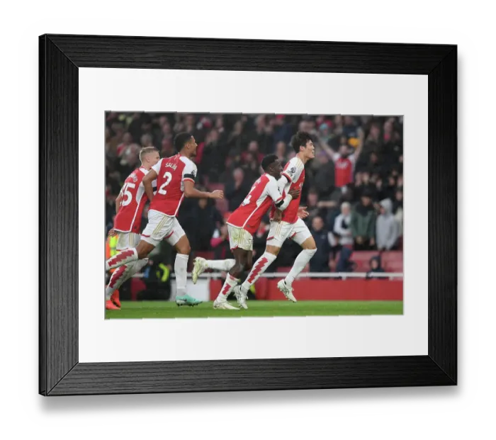 Framed Print : Arsenal's Tomiyasu and Nketiah Celebrate Five-Goal Blitz Against Sheffield United (2023-24)