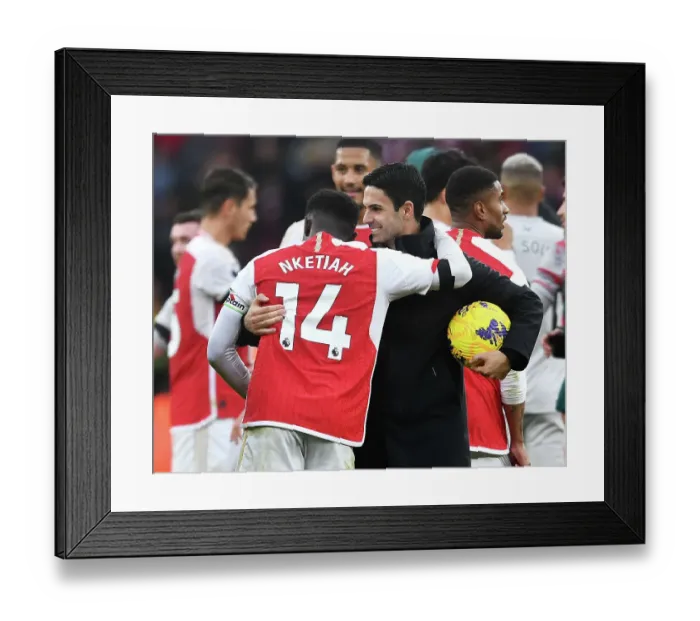 Framed Print : Arsenal's Glory: Arteta and Nketiah Celebrate Victory over Sheffield United (2023-24)