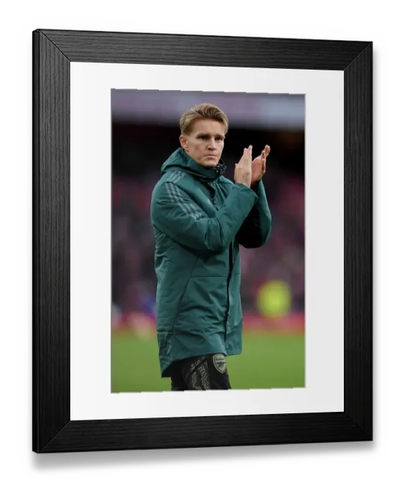Framed Print : Arsenal's Triumph Over Sheffield United: Martin Odegaard Celebrates at Emirates Stadium (2023-24)
