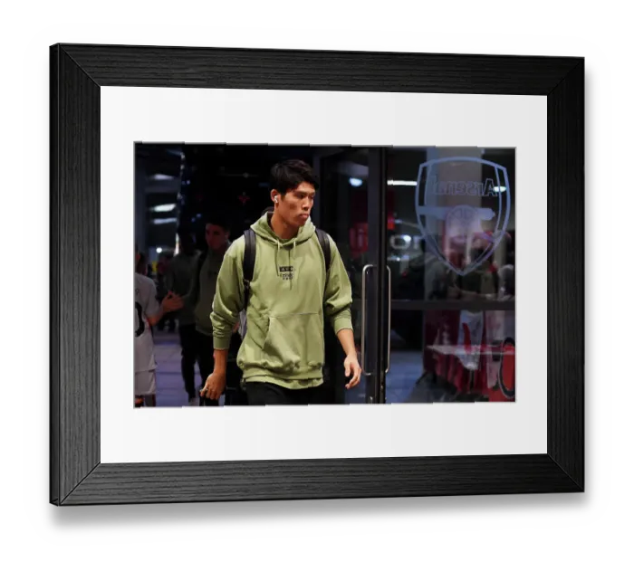 Framed Print : Arsenal's Tomiyasu Arrives at Emirates Stadium Ahead of Arsenal v Sheffield United (2023-24) Framed Print : Arsenal's Tomiyasu Arrives at Emirates Stadium Ahead of Arsenal v Sheffield United (2023-24)