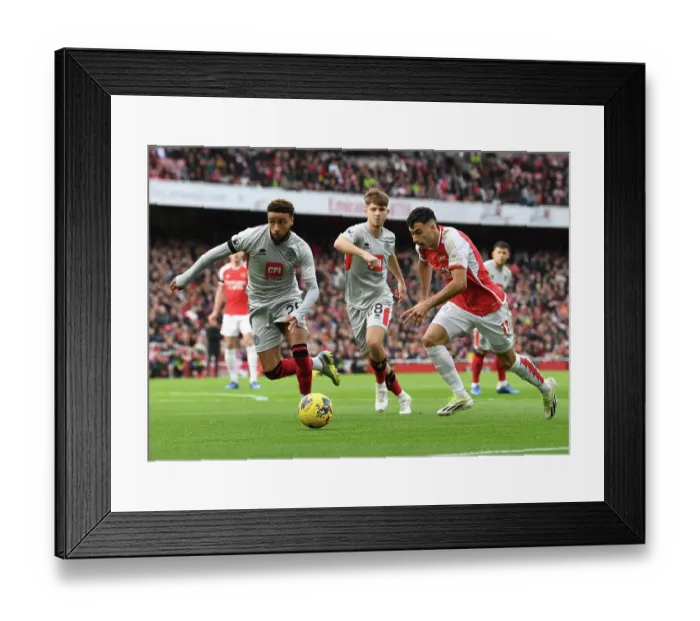 Framed Print : Arsenal's Martinelli Clashes with Sheffield United's Bogle: Premier League Showdown at Emirates Stadium (2023-24)