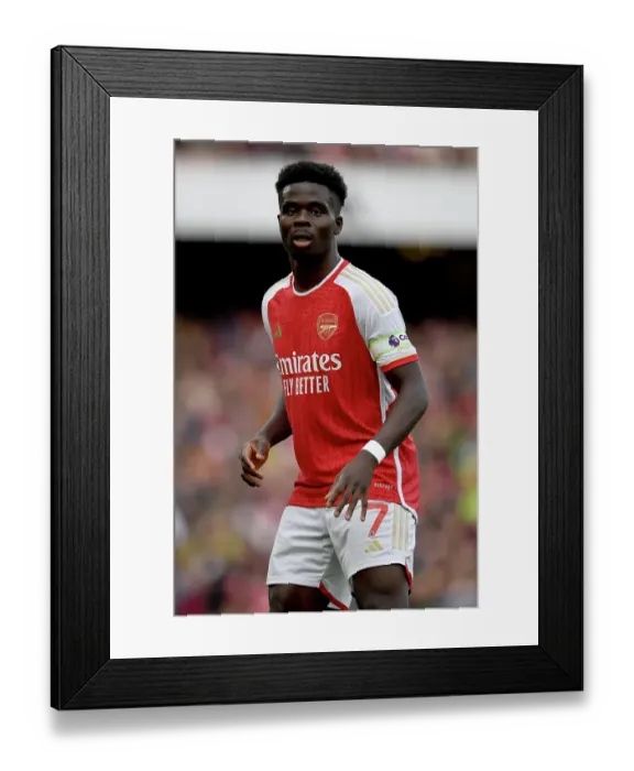 Framed Print : Arsenal's Bukayo Saka Focuses Amidst Premier League Clash Against Sheffield United (2023-24)