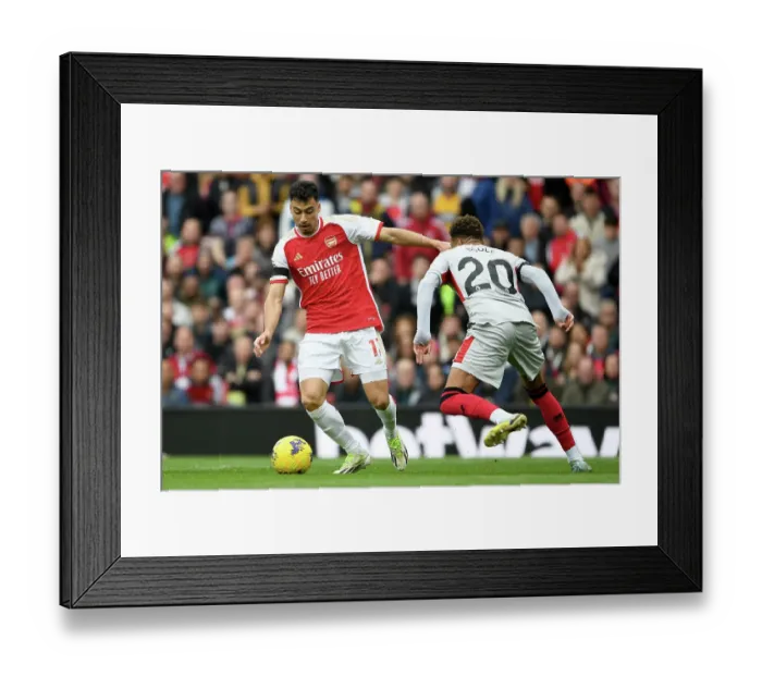 Framed Print : Martinelli Faces Off Against Bogle: Arsenal vs. Sheffield United, 2023-24 Premier League Clash
