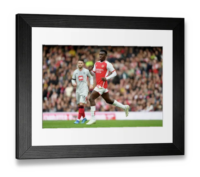 Framed Print : Arsenal's Eddie Nketiah: Unwavering Focus Amidst Emirates Stadium Battle (2023-24) - Arsenal vs Sheffield United
