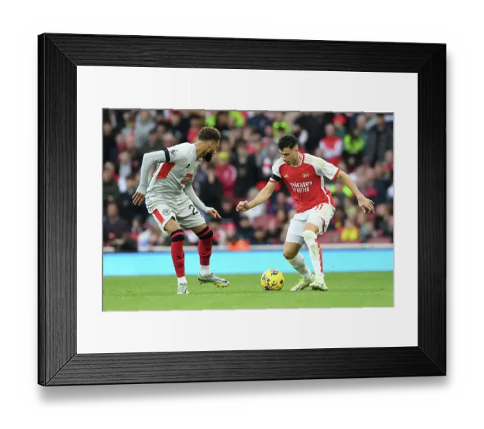 Framed Print : Martinelli Faces Off Against Bogle: Arsenal vs Sheffield United, 2023-24 Premier League Clash