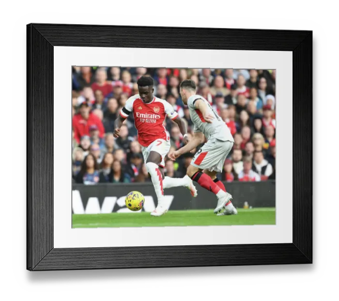 Framed Print : Arsenal's Bukayo Saka Takes on Sheffield United's Jack Robinson in 2023-24 Premier League Clash Framed Print : Arsenal's Bukayo Saka Takes on Sheffield United's Jack Robinson in 2023-24 Premier League Clash