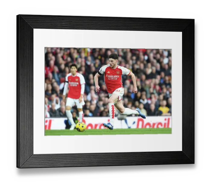 Framed Print : Arsenal's Declan Rice Drives Past Sheffield United in 2023-24 Premier League Clash