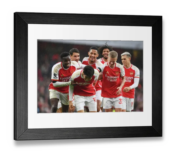 Framed Print : Tomiyasu's Stunner: Arsenal's Fifth Goal Secures Thrilling Victory Over Sheffield United (2023-24)