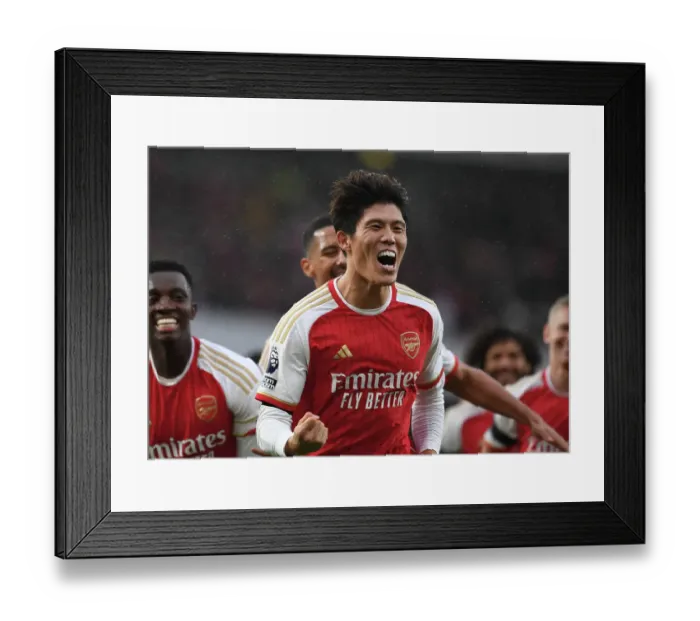 Framed Print : Arsenal's Tomiyasu Scores Fourth Goal in Emirates Victory over Sheffield United (2023-24)