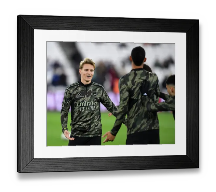 Framed Print : Martin Odegaard Gears Up: Arsenal's Star Prepares for Carabao Cup Showdown against West Ham United Framed Print : Martin Odegaard Gears Up: Arsenal's Star Prepares for Carabao Cup Showdown against West Ham United