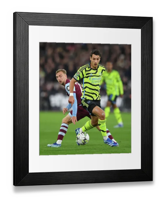 Framed Print : Arsenal's Jakub Kiwior Faces Off Against West Ham in Carabao Cup Battle