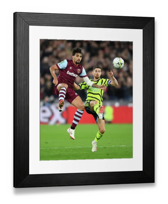 Framed Print : Paqueta vs Jorginho: A Battle for Possession in the Carabao Cup Clash between West Ham and Arsenal