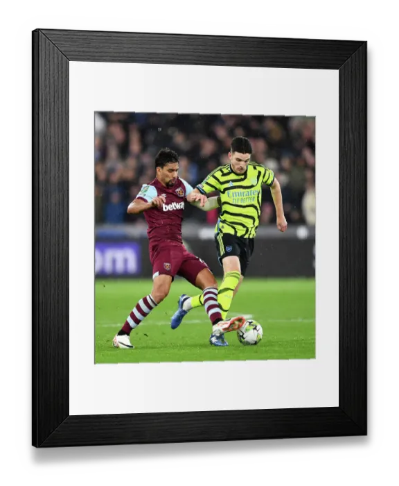 Framed Print : Clash of London Rivals: West Ham vs. Arsenal in Carabao Cup