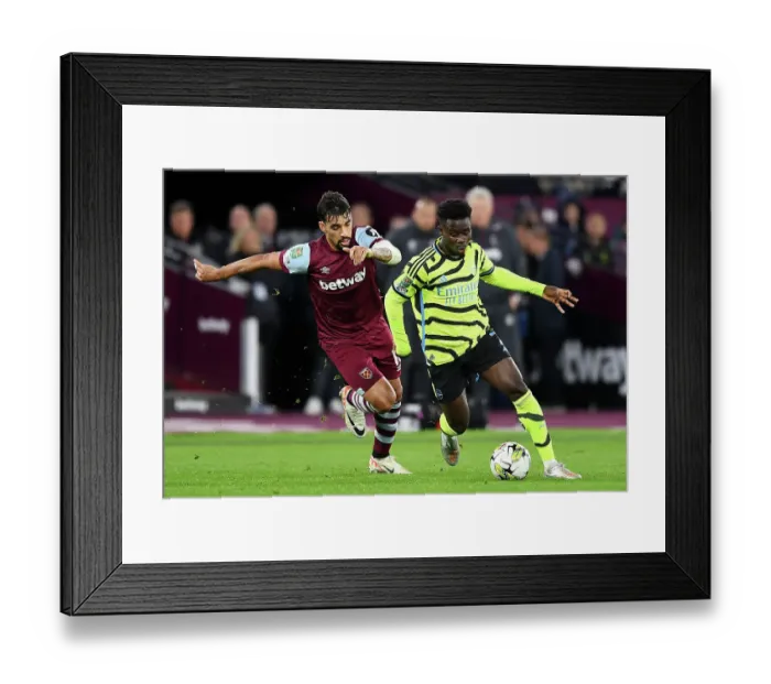Framed Print : Bukayo Saka vs. Lucas Paqueta: A Carabao Cup Battle at London Stadium Framed Print : Bukayo Saka vs. Lucas Paqueta: A Carabao Cup Battle at London Stadium