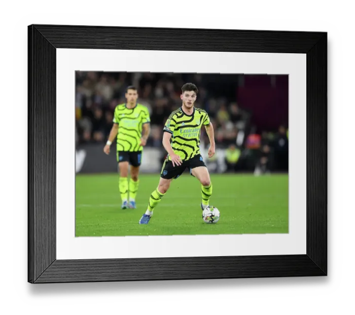 Framed Print : Declan Rice Chases the Ball: West Ham United vs. Arsenal - Carabao Cup 2023-24