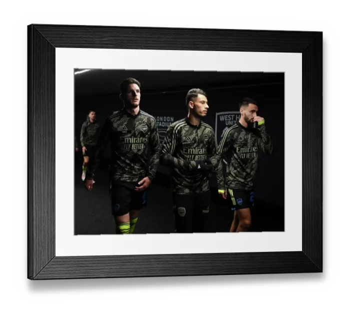Framed Print : Arsenal's Declan Rice Warming Up Ahead of West Ham Showdown in Carabao Cup Framed Print : Arsenal's Declan Rice Warming Up Ahead of West Ham Showdown in Carabao Cup