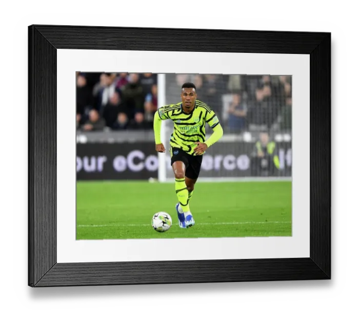 Framed Print : Gabriel's Charging Run: Arsenal's Exciting Push Against West Ham in Carabao Cup