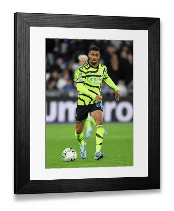 Framed Print : Arsenal's Reiss Nelson Scores Past West Ham in Carabao Cup Showdown Framed Print : Arsenal's Reiss Nelson Scores Past West Ham in Carabao Cup Showdown