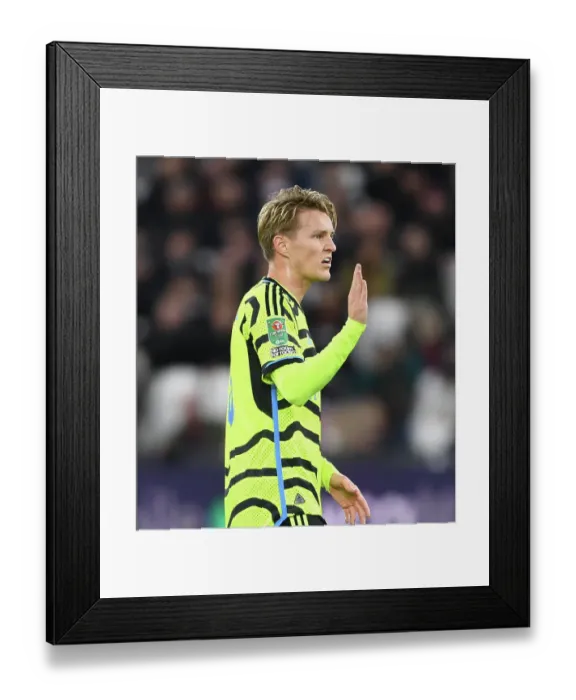 Framed Print : Arsenal's Martin Odegaard in Action against West Ham United in Carabao Cup Fourth Round, 2023-24