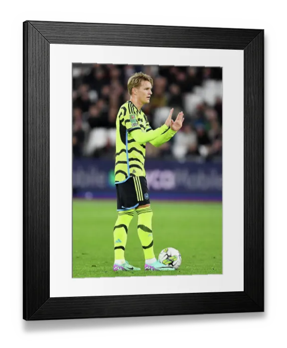 Framed Print : Martin Odegaard Reacts During Intense West Ham United vs Arsenal Carabao Cup Clash, 2023-24