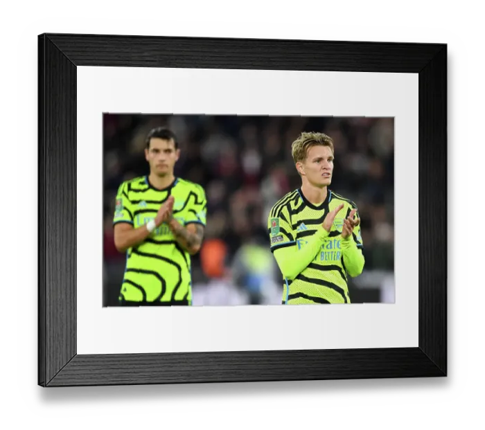 Framed Print : Arsenal's Martin Odegaard Celebrates after West Ham Cup Upset Framed Print : Arsenal's Martin Odegaard Celebrates after West Ham Cup Upset