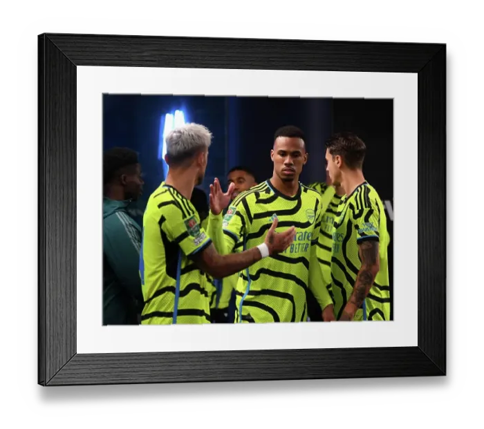 Framed Print : Arsenal's Ben White and Gabriel Share a Moment Before West Ham Clash in Carabao Cup Framed Print : Arsenal's Ben White and Gabriel Share a Moment Before West Ham Clash in Carabao Cup