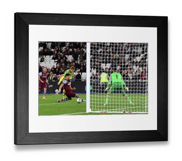 Framed Print : Martin Odegaard Scores First Arsenal Goal: Arsenal Advances in Carabao Cup against West Ham United Framed Print : Martin Odegaard Scores First Arsenal Goal: Arsenal Advances in Carabao Cup against West Ham United