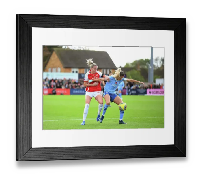 Framed Print : Alessia Russo vs. Laia Aleixandri: Battle for Possession in Arsenal FC vs. Manchester City Women's Super League Clash Framed Print : Alessia Russo vs. Laia Aleixandri: Battle for Possession in Arsenal FC vs. Manchester City Women's Super League Clash