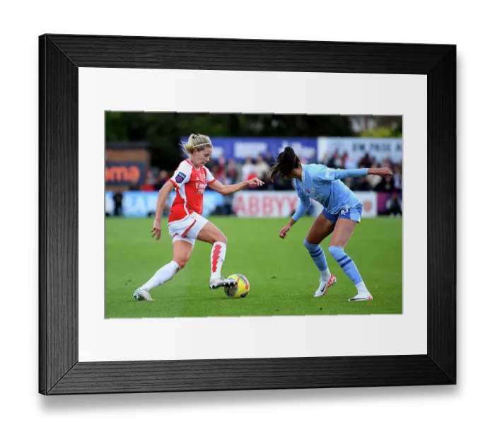 Framed Print : Arsenal vs Manchester City: Intense Battle in Barclays Women's Super League