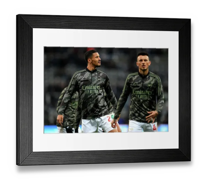 Framed Print : Arsenal's William Saliba Warms Up Ahead of Newcastle United Clash in Premier League 2023-24 Framed Print : Arsenal's William Saliba Warms Up Ahead of Newcastle United Clash in Premier League 2023-24