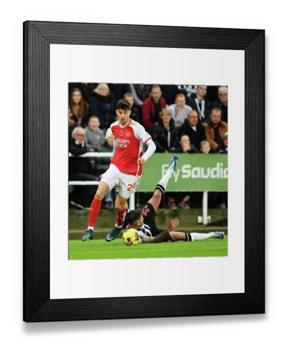 Framed Print : Clash of Titans: Kai Havertz vs Bruno Guimaraes - Newcastle United vs Arsenal FC, Premier League 2023-24