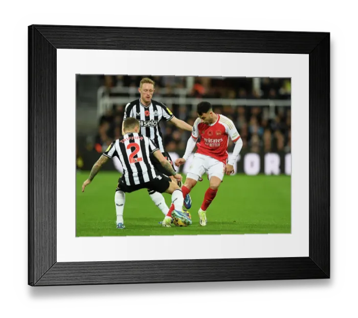 Framed Print : Newcastle United vs. Arsenal FC: A Battle for Possession - Premier League 2023-24