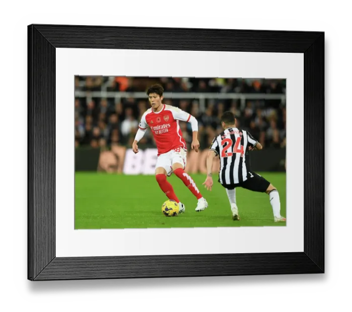 Framed Print : Battle for Possession: Tomiyasu vs. Almiron at St. James Park - Arsenal vs. Newcastle United, Premier League 2023-24 Framed Print : Battle for Possession: Tomiyasu vs. Almiron at St. James Park - Arsenal vs. Newcastle United, Premier League 2023-24