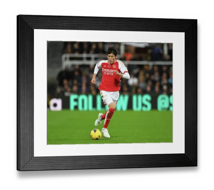 Framed Print : Arsenal's Tomiyasu in Action against Newcastle United - Premier League 2023-24 Framed Print : Arsenal's Tomiyasu in Action against Newcastle United - Premier League 2023-24
